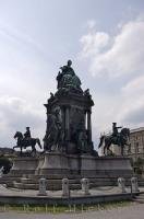 The Maria Theresa Square is in the downtown core of Vienna, Austria with the statue being the center of attention.