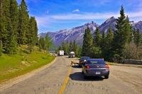 Traffic grinds to a halt along the Minnewanka Loop Road in Banff National Park as visitors stop to take pictures of the wildlife and scenery along the way.