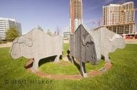 This sculpture is located outside the Mississauga Civic Centre near the Living Arts Centre in Ontario, Canada.