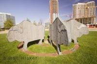 This sculpture is located outside the Mississauga Civic Centre near the Living Arts Centre in Ontario, Canada.