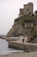 The medieval tower Aurora located upon the hill in Italy is just one of the fascinating pictures for your memory book from your trip to Monterosso, Liguria.