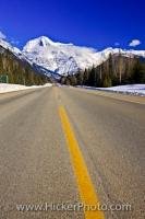 A road called the Yellowhead Highway leads to the beautiful winter scenery of the snow covered Mount Robson. Mount Robson is part of the Mount Robson Provincial Park in British Columbia, Canada.