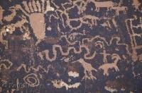 A mosaic of native petroglyphs on Newspaper Rock near Canyonlands National Park in Utah, USA.