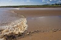 A tidal bore, a natural phenomenon which happens twice a day at Truro, in Nova Scotia, reverses the flow of the Salmon River during an incoming tide in the Bay of Fundy.
