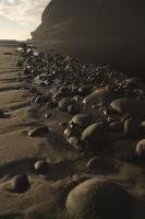 The Kohaihi River flows towards the sea passing through the Kahurangi National Park and these sandy and rocky shores in the South Island of New Zealand.