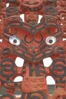A carved panel of some Maori Symbols found at the entrance of Whakarewarewa Thermal Reserve in Rotorua, New Zealand.