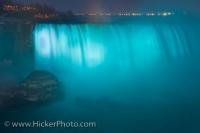 As night arrives in Niagara Falls in Ontario, Canada, the Horseshoe Falls are illuminated with various lights, these particular ones being a beautiful shade of blue.