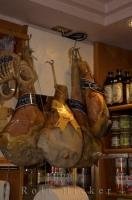 The famous Parma ham hanging on display in the city of Venice, in Veneto, Italy in Europe.