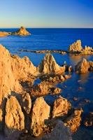 Erratic formations of volcanic rock are characteristic of Parque Natural de Cabo de Gata along the Costa de Almeria of Andalusia, Spain.