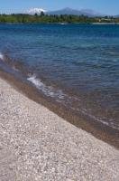 The pristine pebble beach of Mission Bay at Lake Taupo is a great place for a family outing.