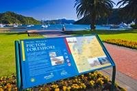 The tastefully landscaped foreshore in the town of Picton is a beautiful place to sit and watch sailboats tugging gently against their moorings or ferries plying the blue waters of Queen Charlotte Sound in Marlborough, New Zealand.