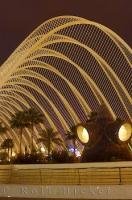 The usually white arches of L'Umbracle glow in the evening lights in the city of Valencia, Spain.