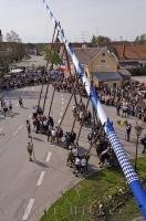 An aerial shot of a Bavarian village where the Maibaumfest is held called Putzbrunn, Germany.
