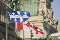 Stock Photo of a Canada Flag beside a Quebec Flag