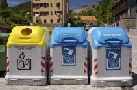 Blue and yellow recycling bins are part of the environmental program to help residents with their waste in Aragon, Spain in Europe.
