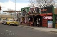 A shop in Seligman captures the history with signs and mannequins along Route 66 in Arizona, USA.