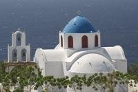 A truly classic picture of Santorini in Greece, a popular vacation destination situated in the Aegean Sea.