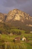 At sunset, the sun shines on Hammerwand near Voels in Naturpark Schlern in South Tyrol, Italy in Europe.