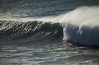 A stunning show of sea spray and foaming water along Cannon Beach in Oregon, USA.