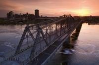 Pont Alexandra Bridge crosses the Ottawa River from Nepean Point in Ottawa, Ontario to the city of Hull in Quebec, a great area for a vacation.