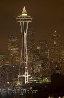 The famous Space Needle, backdropped by the Seattle city lights in Washington, USA.