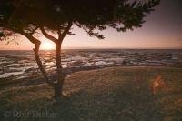 Sunset along the shores of the St Lawrence River in Quebec, Canada near Rimouski.