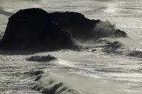 A spectacular scene of the Pacific Ocean surf pounding the rocks along Cannon Beach in Oregon, USA.