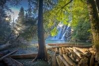 After a strenuous drive and a short hike on a trail through a forest on Vancouver Island which spills you out onto the driftwood strewn pebble banks of a river, views of a surreal and scenic waterfall - the Virgin Falls, appear before your eyes.