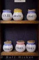 Cute cork topped Terres de Biot pottery jars displayed at a shop in Nice, Provence, France.