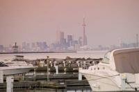The marina in Port Credit affords great views across Lake Ontario to the metropolis of Toronto and is a great place to spend a vacation in Canada.