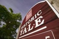 A sign displaying the historic town of Yale, the oldest and most historic community in British Columbia, Canada.