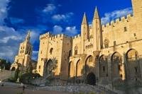 A fascinating travel destination is the ancient walled city of Avignon in the Vaucluse region of Provence, France including its famous tourist attraction Palais des Papes.