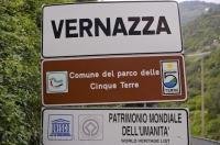 The travel destination sign for the town of Vernazza, Italy in Europe marks the beginning of an enjoyable vacation.