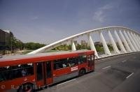 A bus cruises across the Puente de la Exposicion in Valencia, Spain, a bridge that is designed from architecture for the twentieth century.