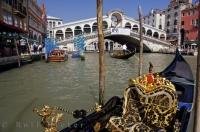 The Venetian bridge Ponte di Rialto as seen from a Gondola on the Grand Canal in Venice, Veneto in Italy.
