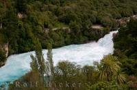 An overhead look at the fascinating Waikato River where the Huka Falls on the North Island of New Zealand thunder over volcanic cliffs.
