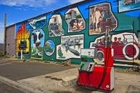 A collection of wall murals make up the Reflections of Opunake display along the Surf Highway in the Taranaki region.