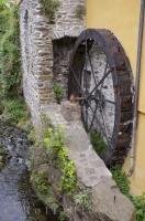An old water wheel seen along the road to Vernazza in the Liquria, Italy.