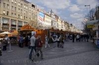 Wenceslas Square in the downtown area of Prague in the Czech Republic always has people wandering throughout the market stalls.