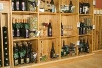 A shelf with a variety of wine racks and singles bottles at the Hawthorne Mountain Vineyards in the Okanagan Valley in British Columbia, Canada.