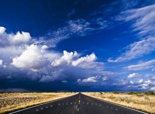photo of Endless Desert Road Storm Clouds New Mexico