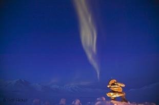 photo of Inuit Art Sign Inukshuk Northern Lights