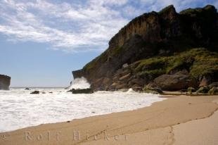 photo of Sand And Waves West Coast Tasman Sea South Island New Zealand