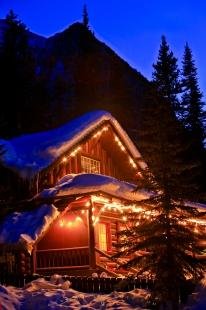 photo of Snow Covered Log Cabin Dusk Winter Scene