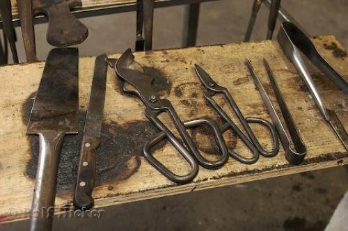 Photo of a few of the special equipment needed when<br />handling molten glass. Photo: 
Picture Of Glass Handling Equipment