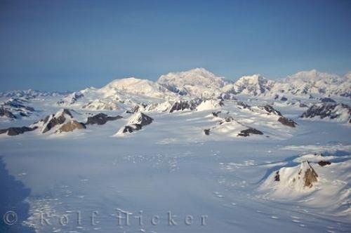Photo of the rock formations peeking through the snow covered landscape in the mountainous valleys of the Yukon. Photo: 
Snow Covered Rock Formations Mountainous Landscape Yukon
